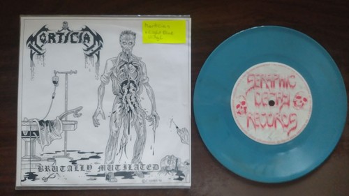Mortician brutally mutilated - brutally,